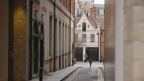 People-Walking-Past-Office-Buildings-In-Bourdon-Street-Mayfair-London-2